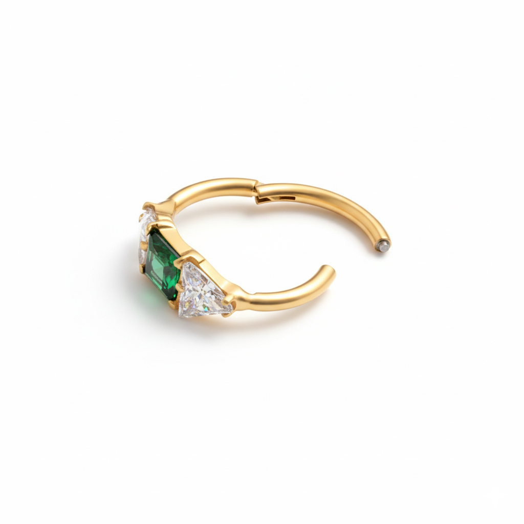 Titanium ring with central green stone