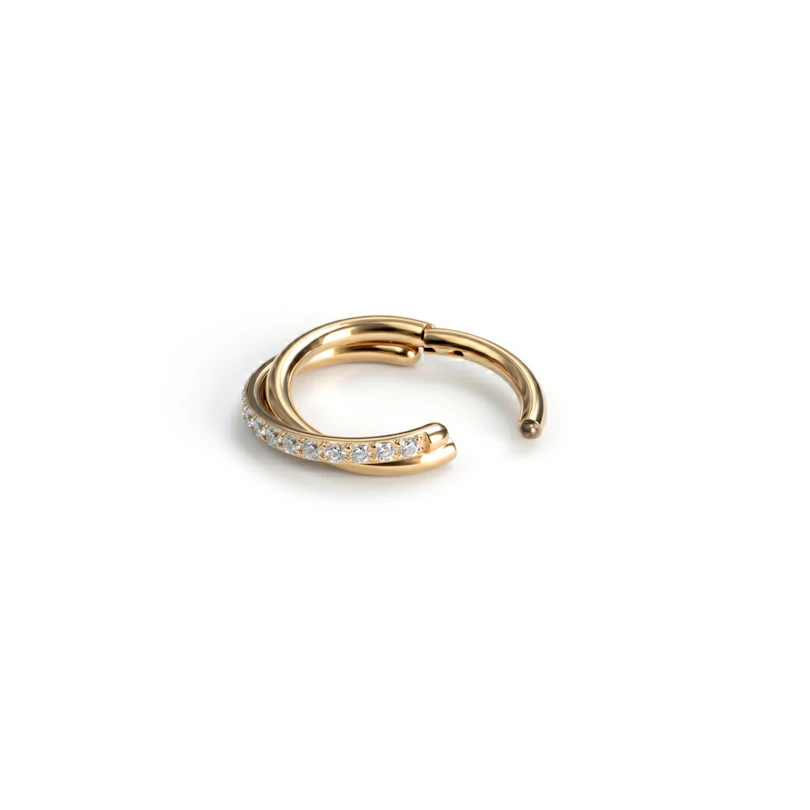 Cross over titanium ring with cubic zirconia gems
