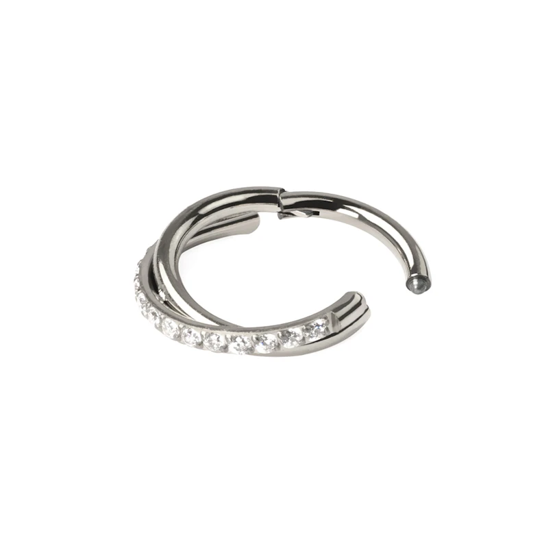 Hinged segment ring with stone-paved crossover arch