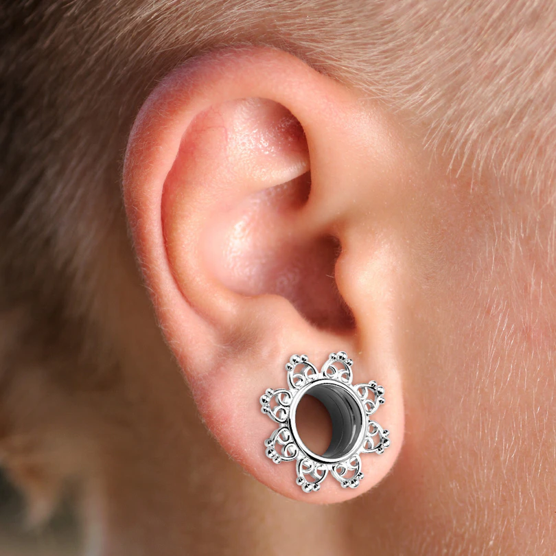 Tunnel made of surgical steel with tribal design