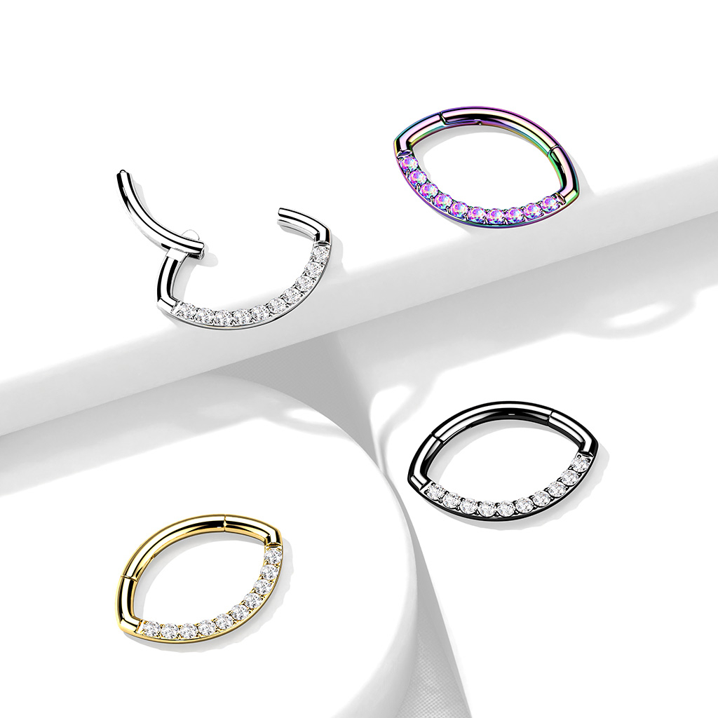 Hinged ring with oval shape and row of stones