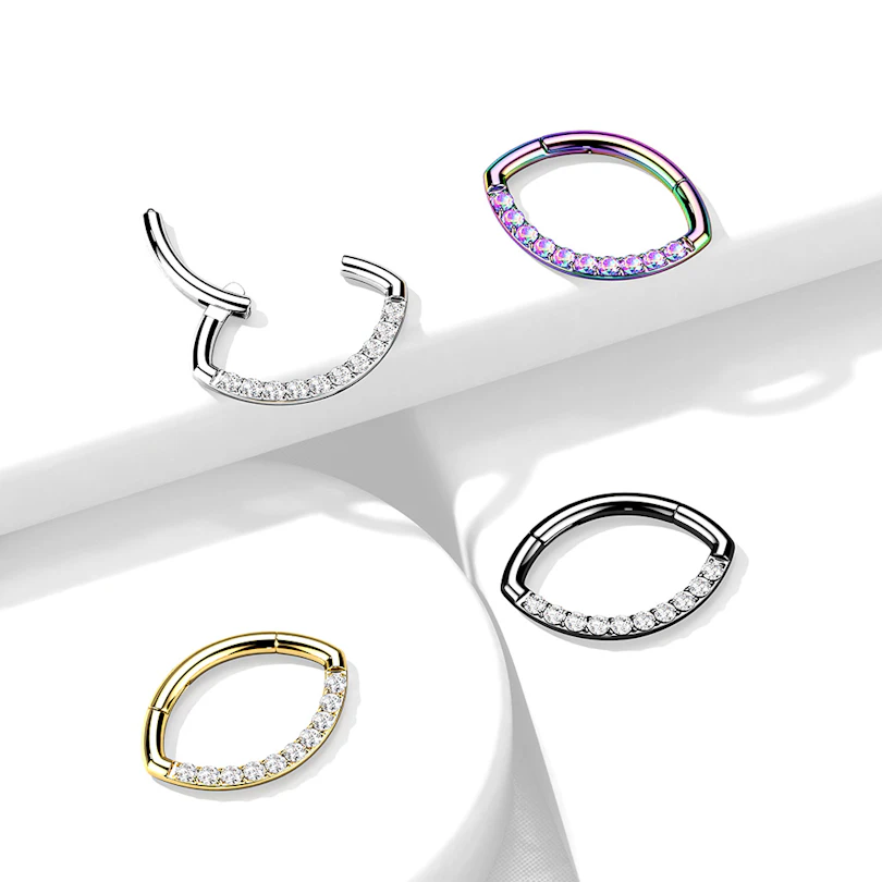 Hinged ring with oval shape and row of stones