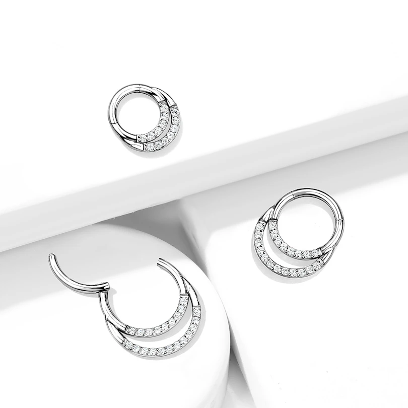 Hinged titanium ring with stones in two rows