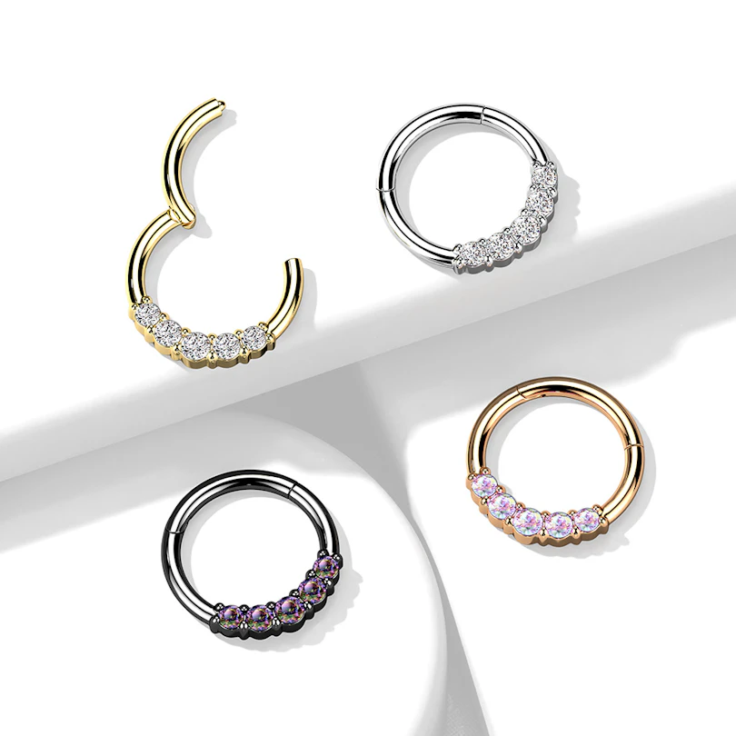 Hinged ring made of surgical steel with five gemstones